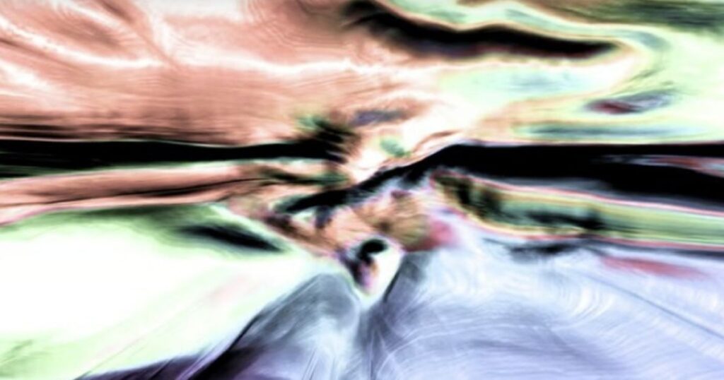 An abstract blur of pink, green and pale lilac shapes dissolving into one another